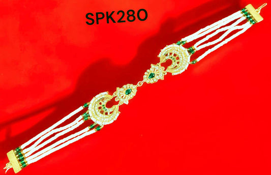 Rajasthani Multi-Strand Green Stone Rakhdi  for Women